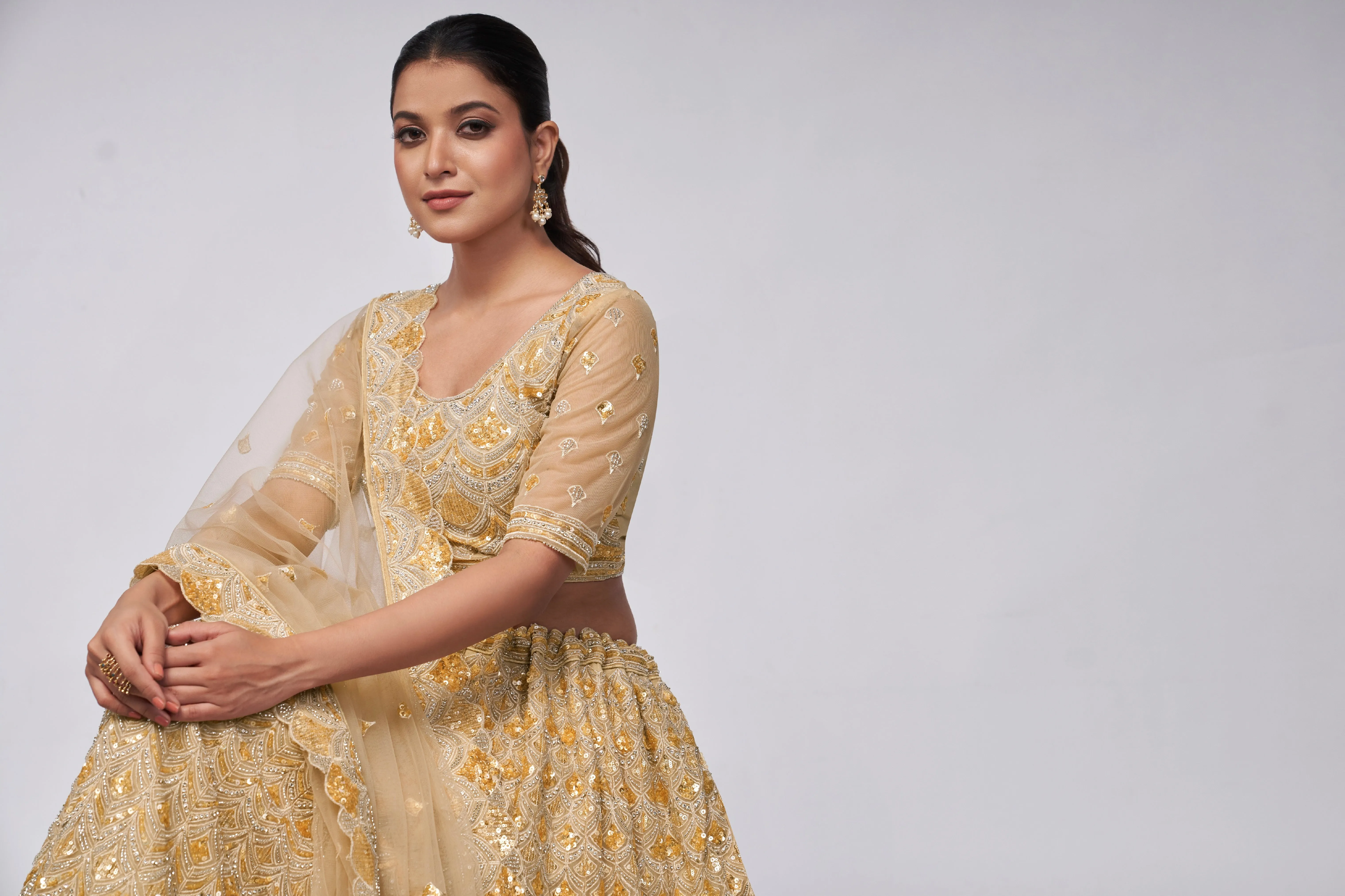 Golden Lehenga Set with Leaf Pattern & Sequin Embellishments