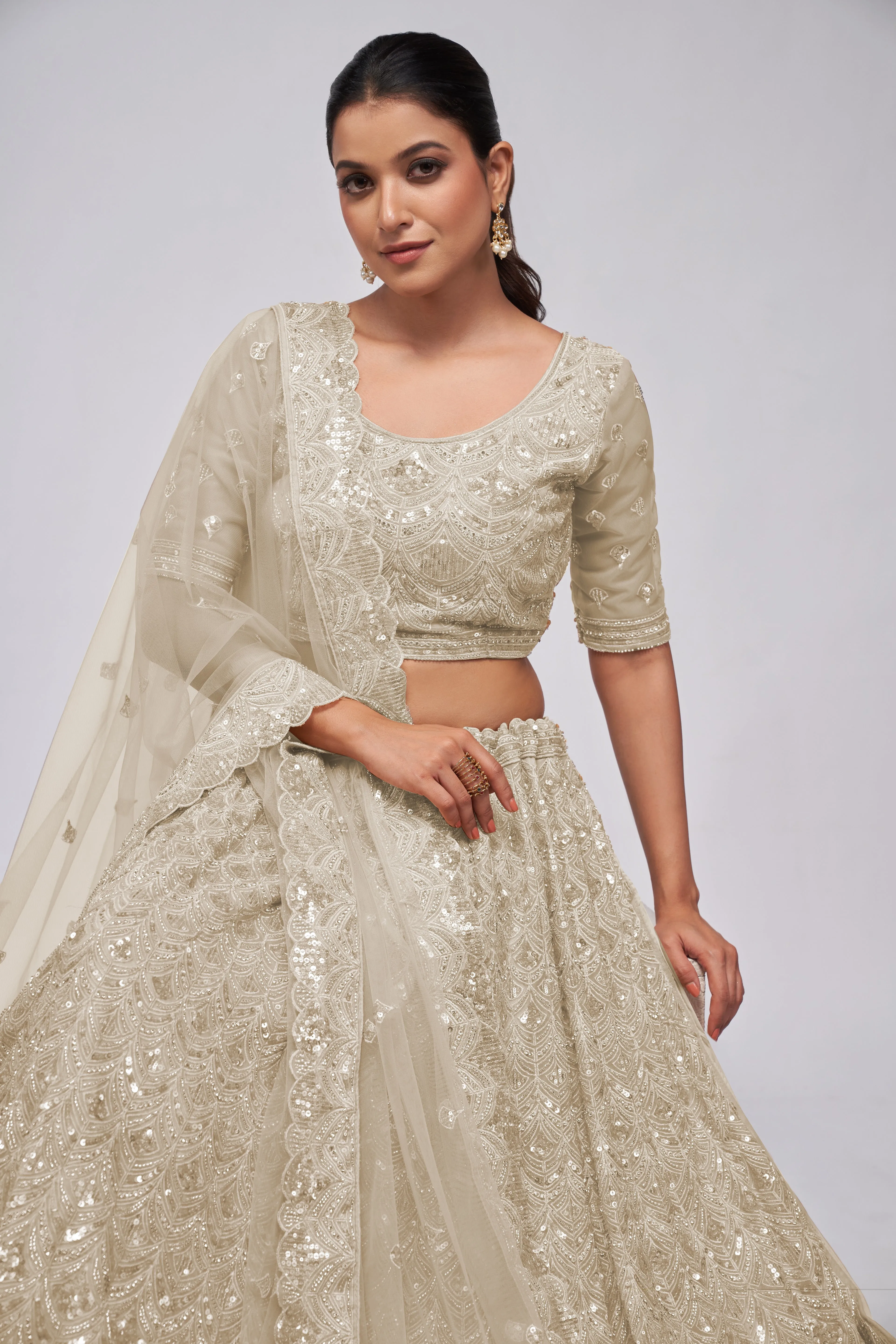 Ivory Lehenga Set with Sequin & Stone Embellishments
