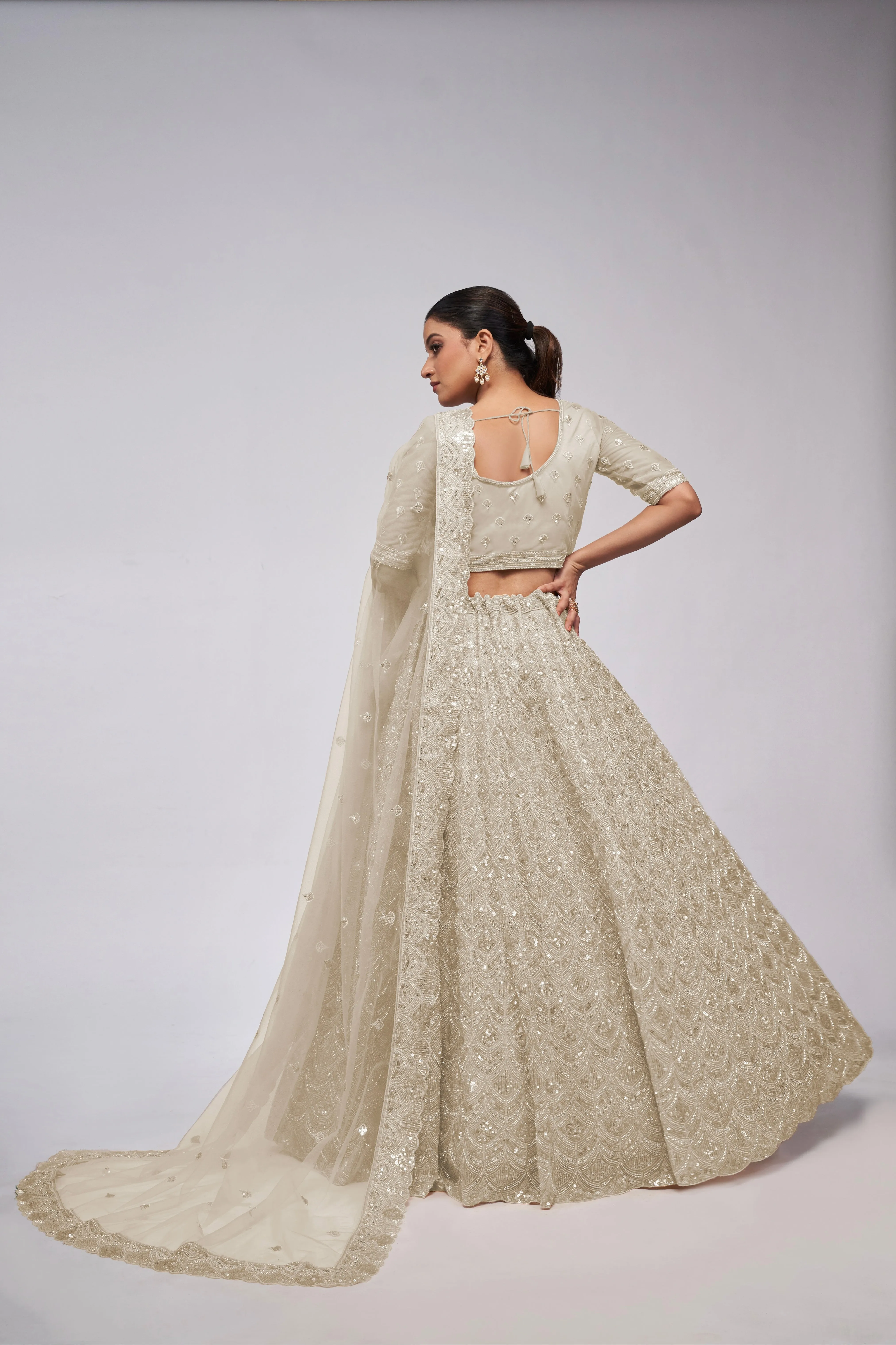 Ivory Lehenga Set with Sequin & Stone Embellishments