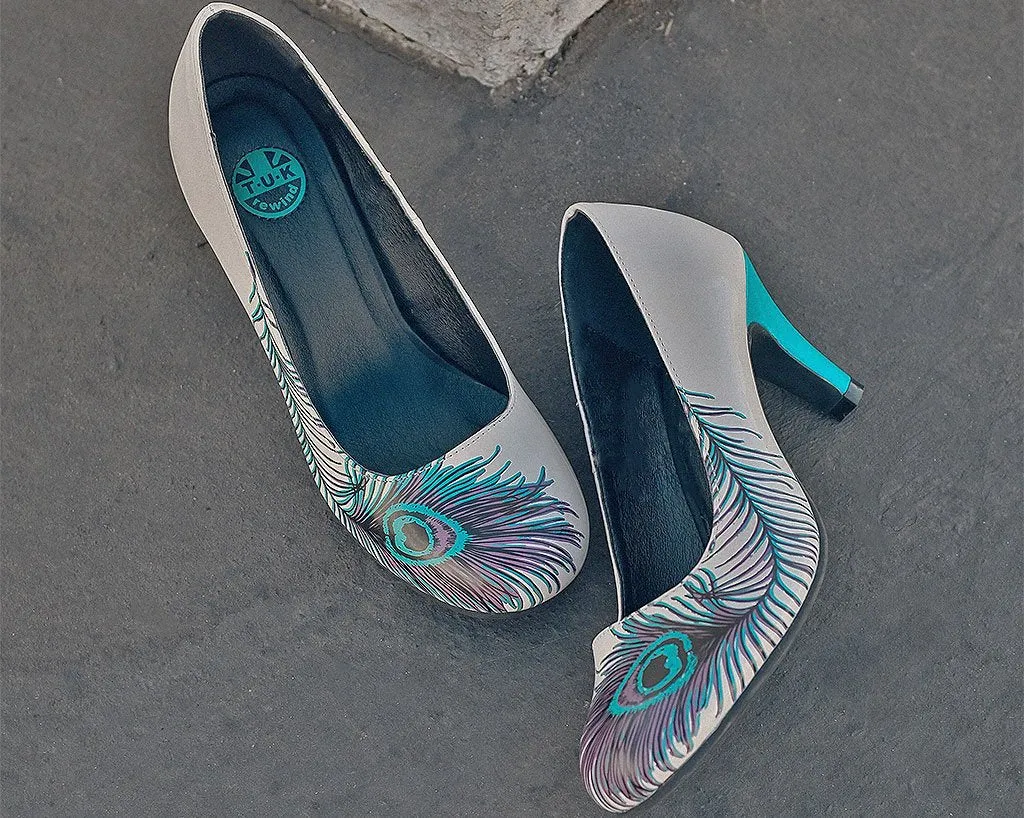 Peacock feather anti-pop heel